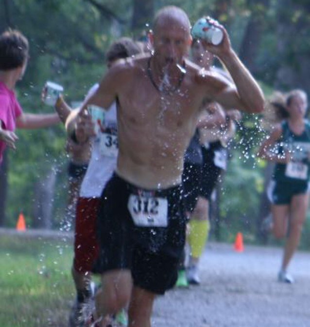 married, 2 daughters,  runner, track coach,