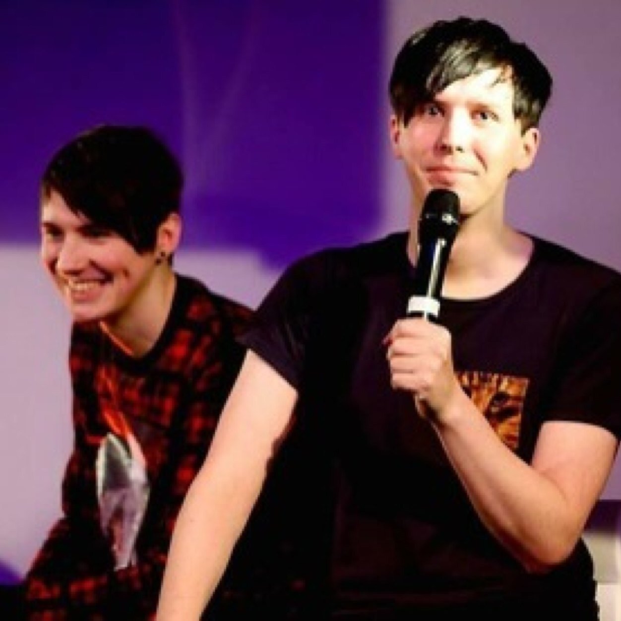 Two boys with cat whiskers