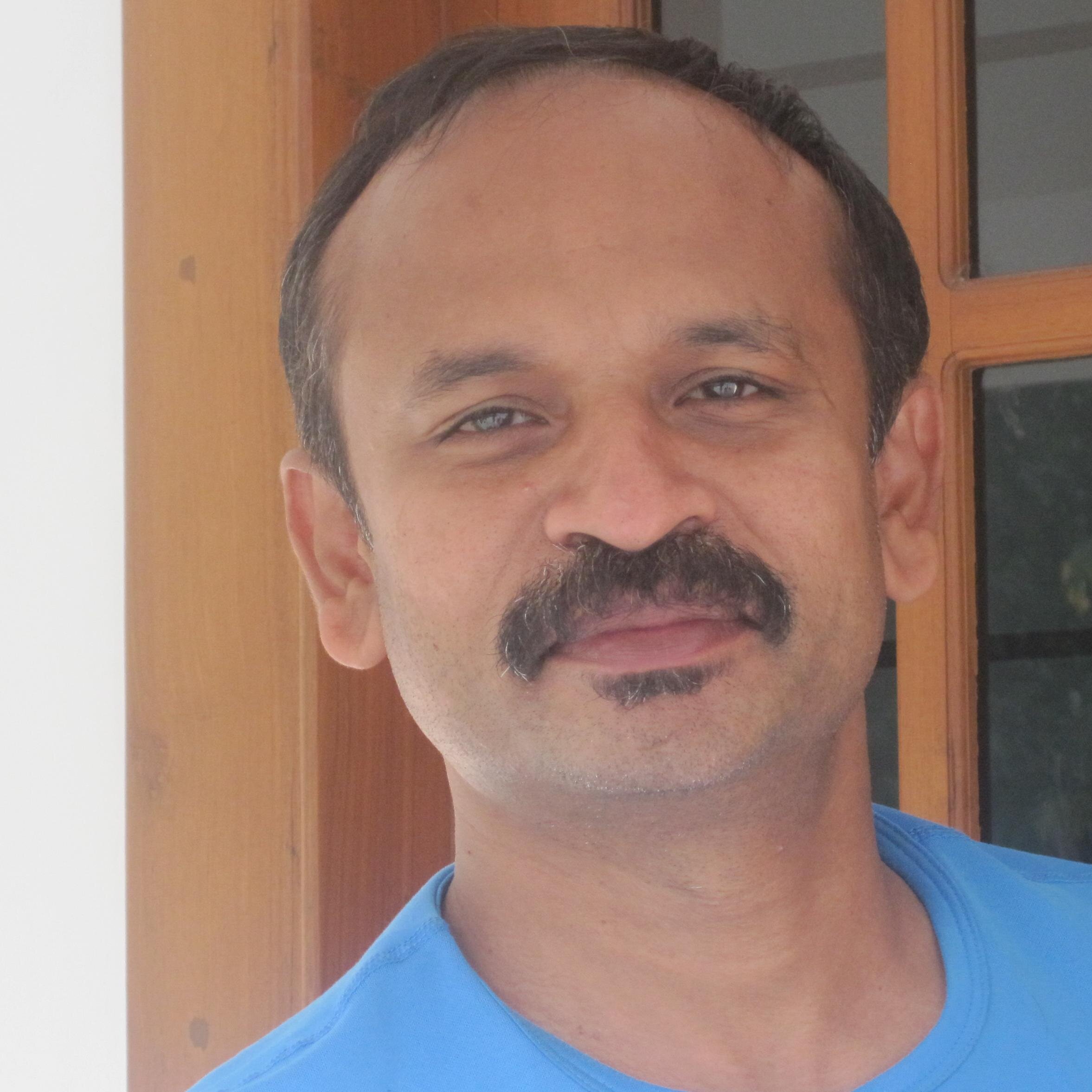 rjthattil's profile picture. 