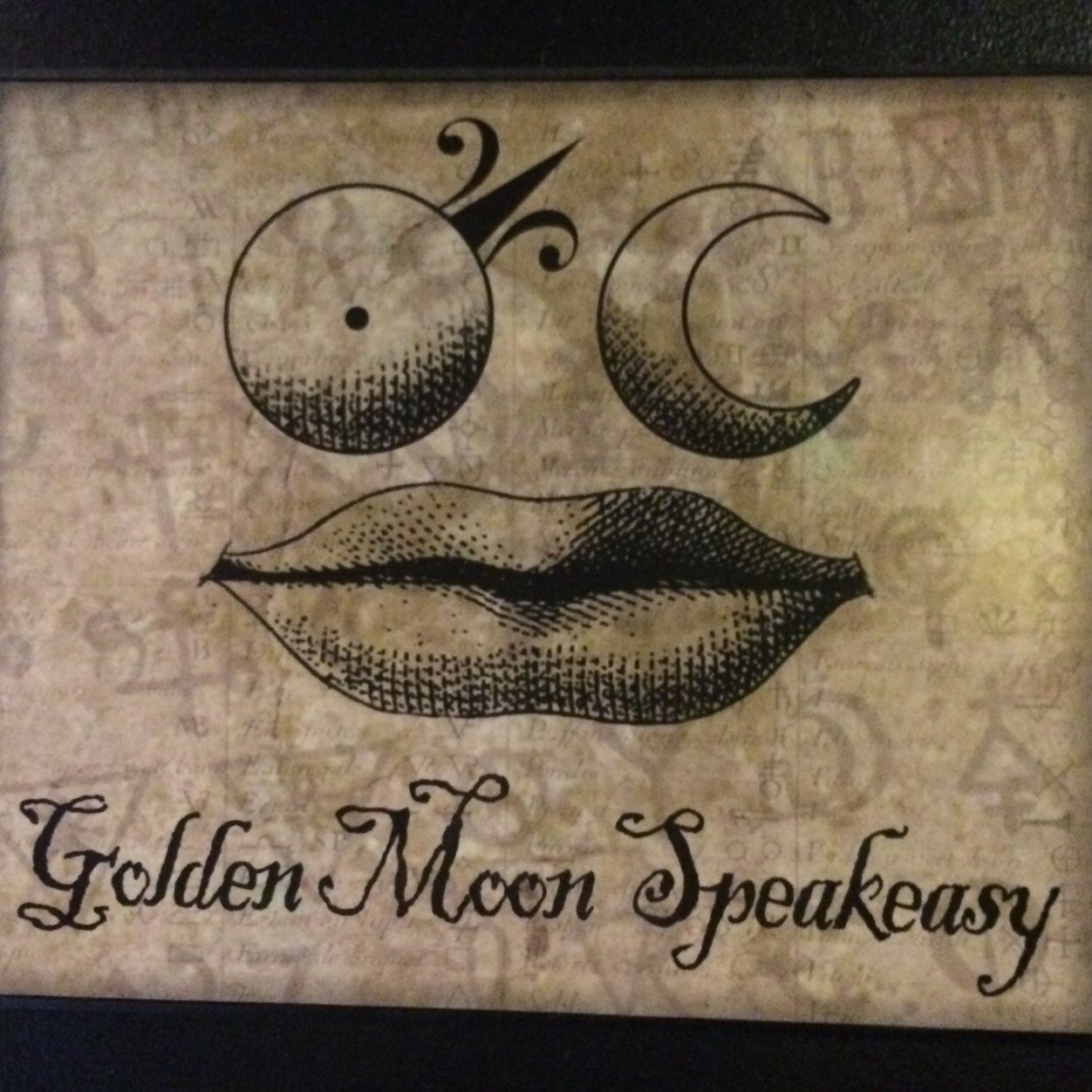 Speakeasy style tasting room and cocktail lounge for Golden Moon Distillery.
