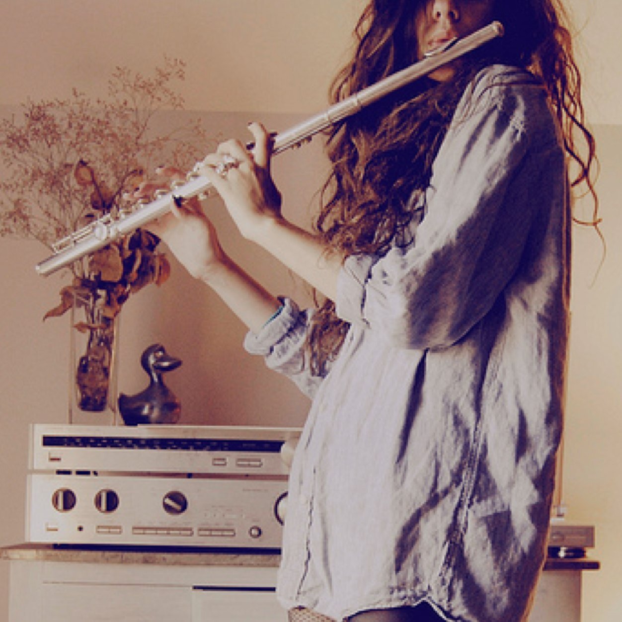 in the band. flute/picc player. crazy curly hair. college girl. aspiring composer. jazz band. alto sax/trumpet. im weird. banon