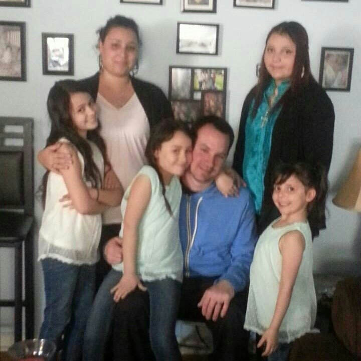 married, father of five.