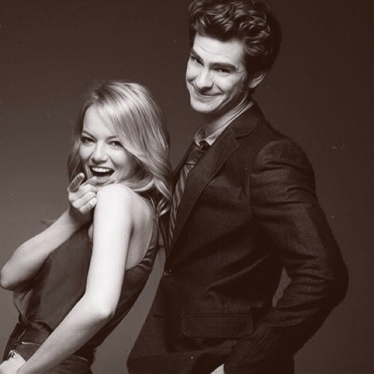 With Great Power Comes Great Responsibilitys- Peter Parker Ive fallen in love with andrew garfeild and Emma Stone