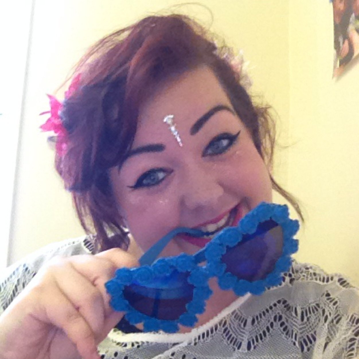 Ameliacolee's profile picture. Smile because you never know where the next camera will be.