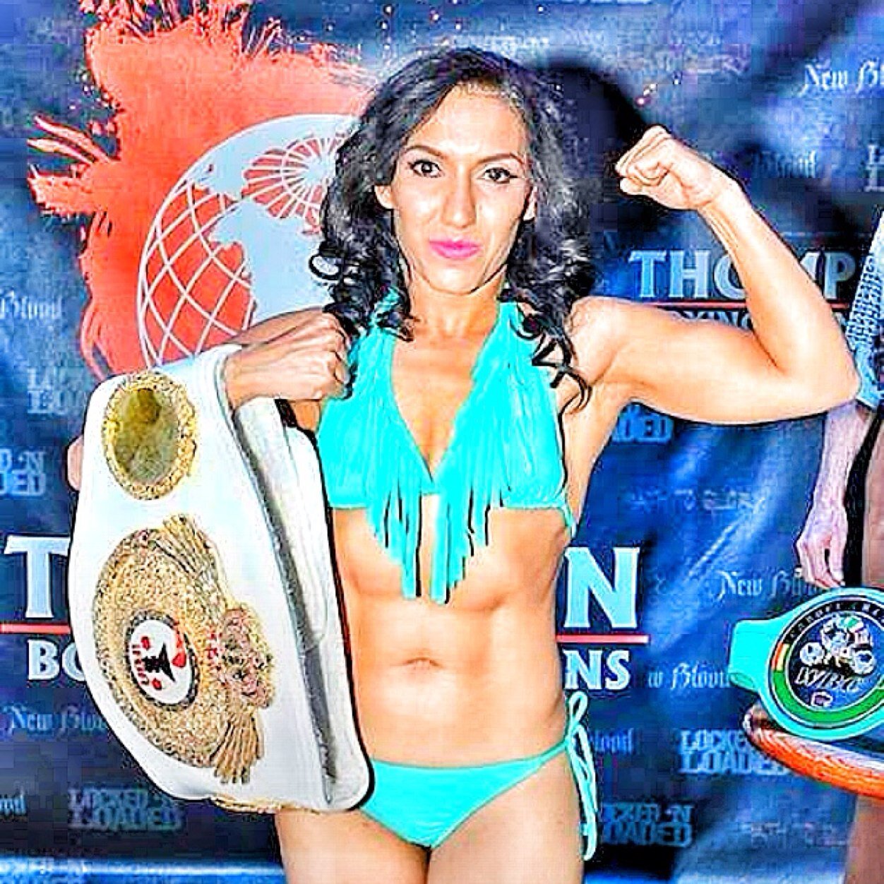 My name is Sindy Alacrana or Scorpion Amador. I am a professional boxer jr flyweight 108 pounds . Current IFBA world champion . I fight out of Riverside, CA.