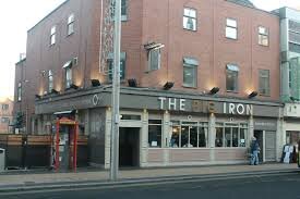 Serving drinks and showing live sports on TV at Pig Iron sports bar in Middlesbrough
