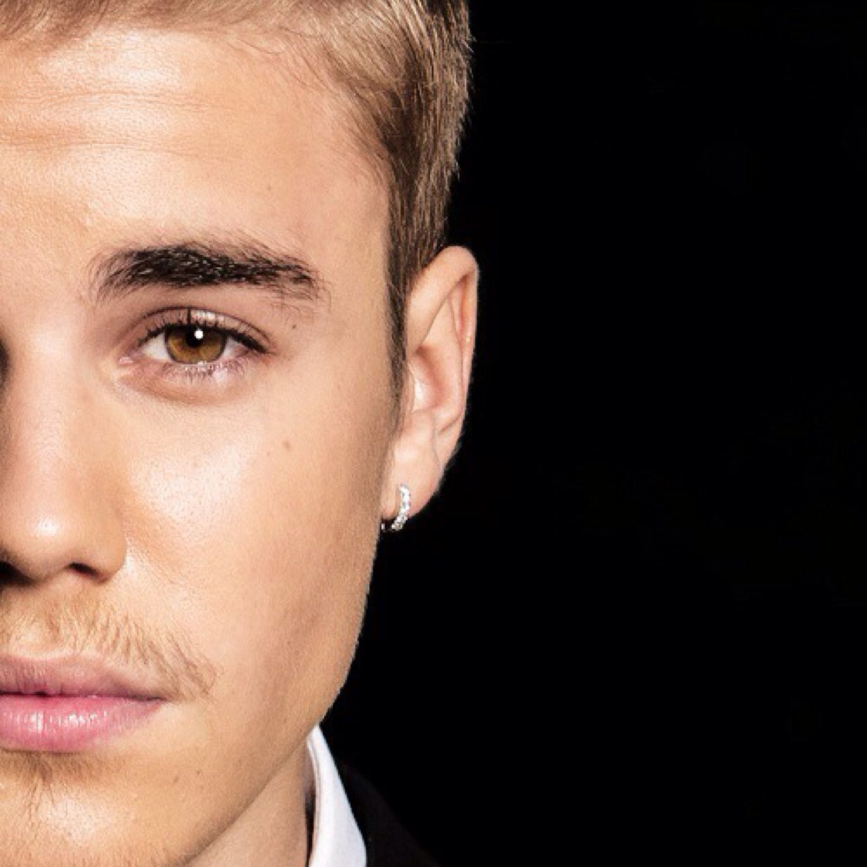 Use the hashtag #biebersmilepr on IG or Twitter w/ a photo of you holding a sign or something.