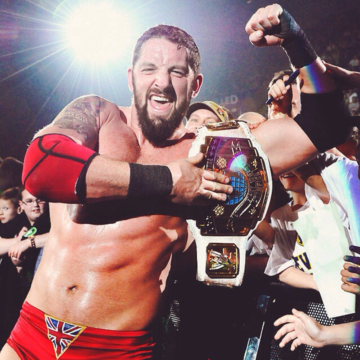 A British Brawler, with a touch of extravagance. I have come to deliver bad news, while dominating within the squared circle. I am your IC champ.