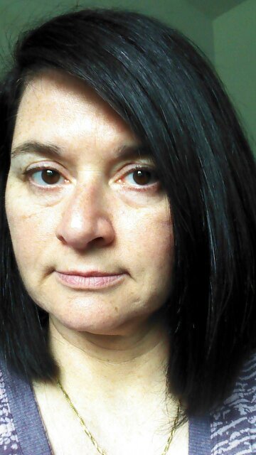 48 yr old , mom of 4 wonderful and grown children!  No grandkids yet :(