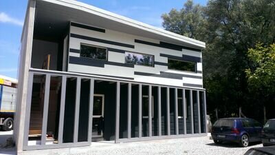 Società edile specializzata nella costruzione di case in legno ed ecomuratura.