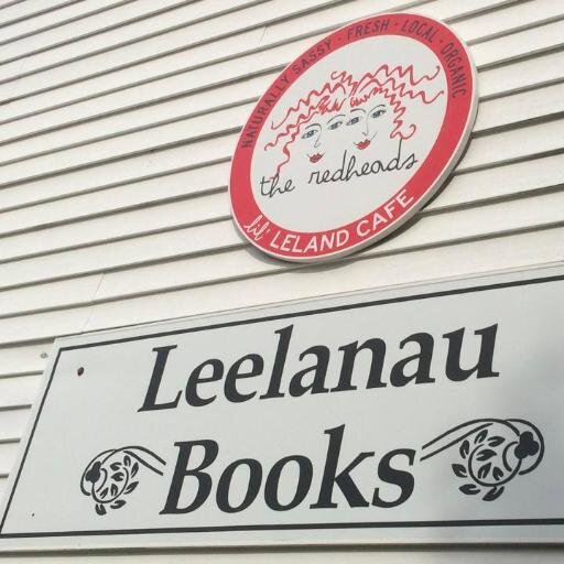 A store with books and a staff that reads them.