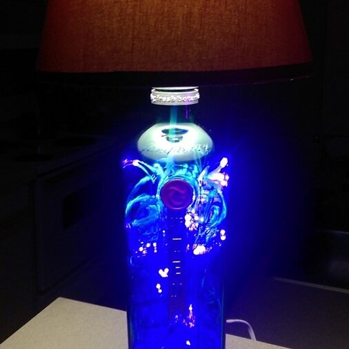 One Man's trash is another Man's...um, lamp. I like to take interesting liquor bottles and make them into something that catches the eye and illuminates