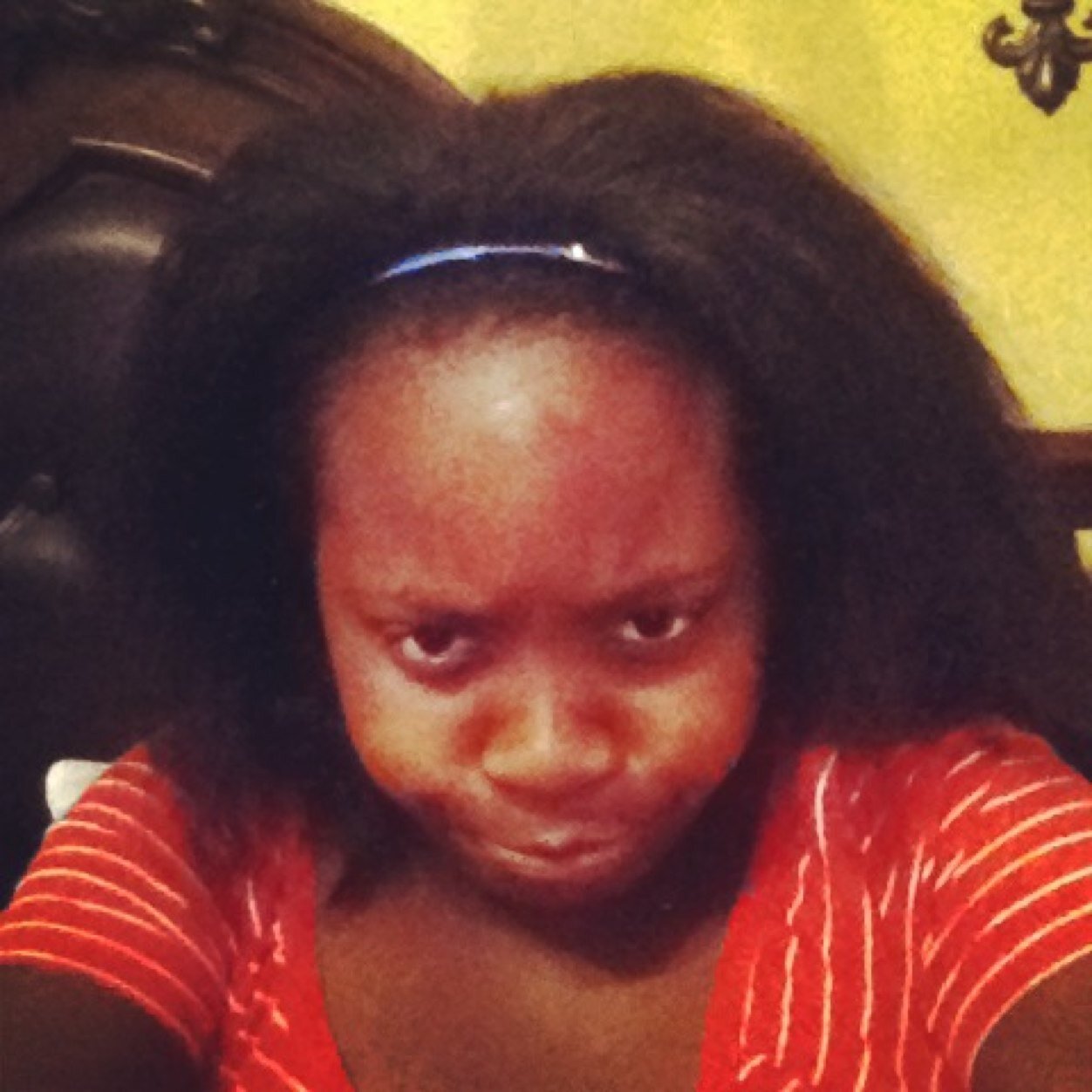 Me when my hair is wild and to fix it I put a scrunchy on it.