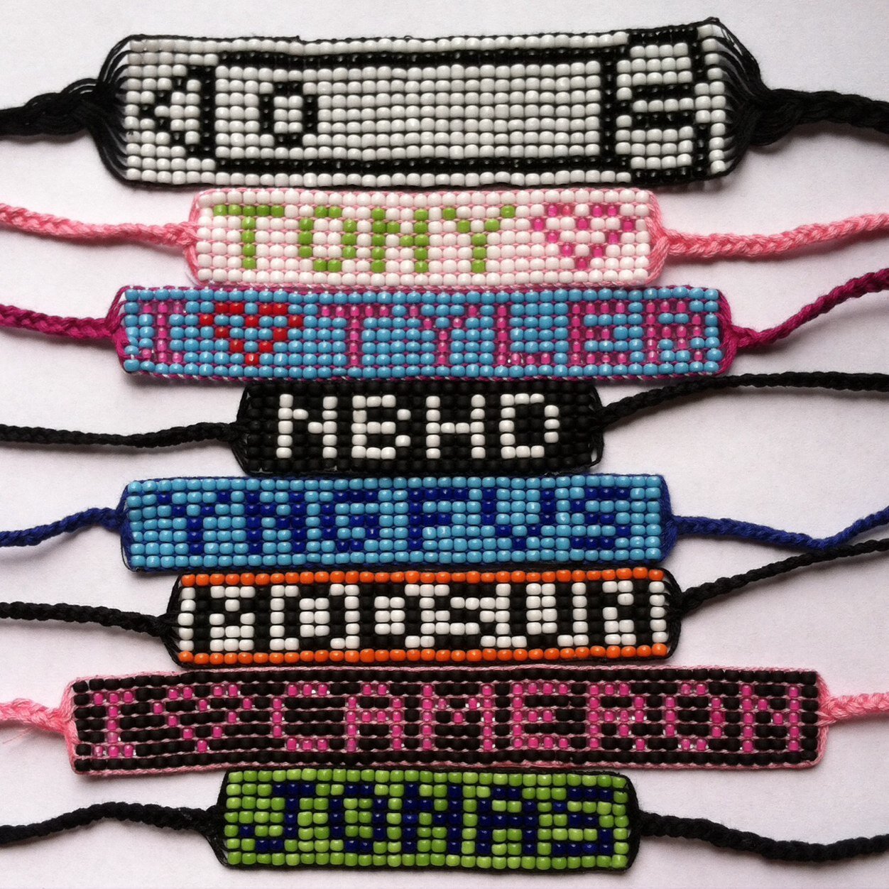 Hi :) We make bracelets to spread the word about your favorite bands. We can custom make them, any color any saying. Let us know if your interested! :)