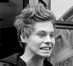 Tweeting pictures of @Luke5SOS and hoping that he will follow me..