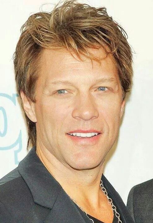 John Bon Jovi... Sexiest living man ever...! God is my SUPERHERO...! :)