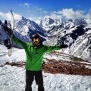 Snowboarder looking for powder....