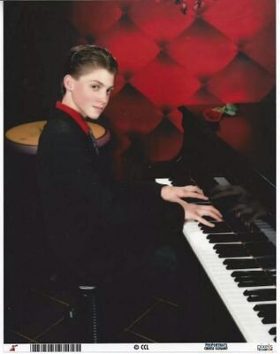 I'm a pianist with a piano solo album called Looking Through the Rain. I love to share my music with others and I am always writing! I'm a language learner too!