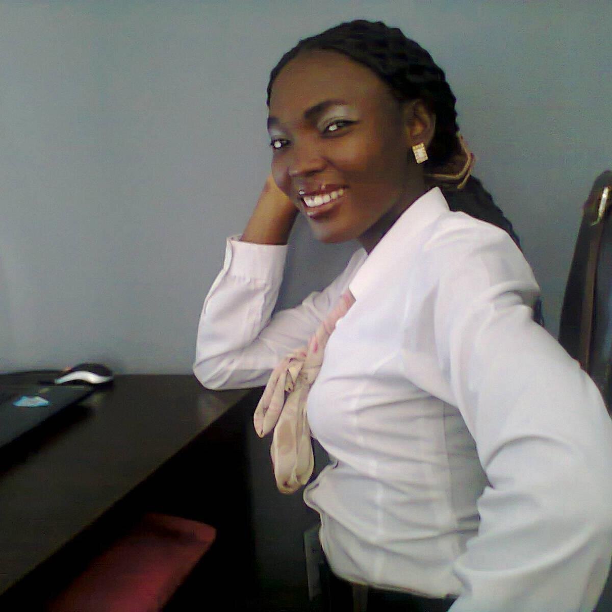 Slim, dark skinned, Harriet and Philip's mummy, I have a smile that affects, and I like eating rice!
