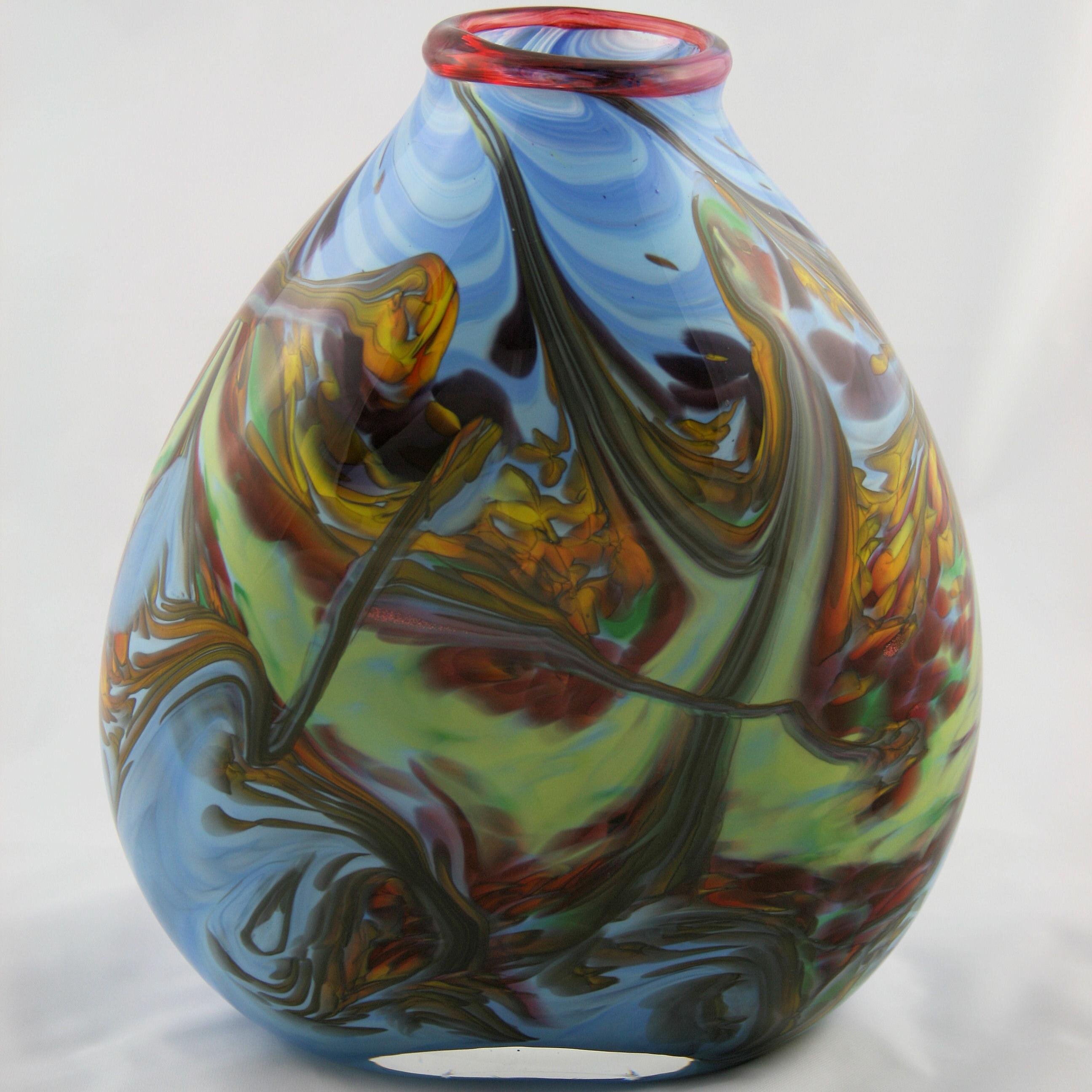 RonHinkleGlass's profile picture. Ron Hinkle is a master glass blower in West Virginia. He makes art vases, tableware, decorations, etc.
