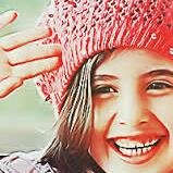 ‏‏متفائلة لحد الجنون وشعاري  ابتسم ترى  جمال الروح الحقيقي