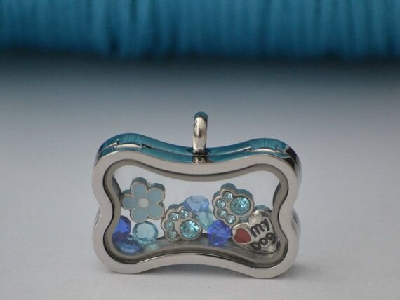 I can create for you a beautiful dog bone shaped locket to show your love of dogs.