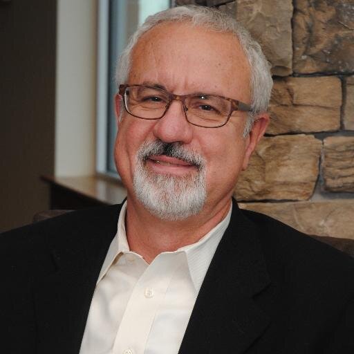 Prof at Wheaton College Graduate School. Half-Guatemalan. Involved in immigration reform. Married to Joan, two sons.
