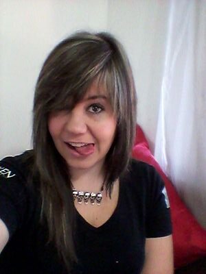 Professional air guitarist. Lives to have fun and waste her life away in books. Oh I kinda play with hair for a living too.