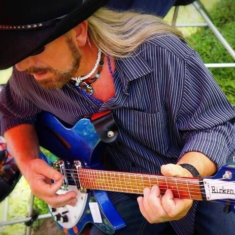 Singer, songwriter, and 12 string guitarist from north-central West Virginia.