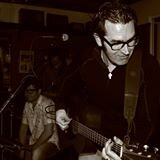 Irish singer songwriter with a wide range of musical influences performing with the Seven Wonders.