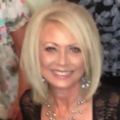 Designer of bespoke children's heirloom clothing