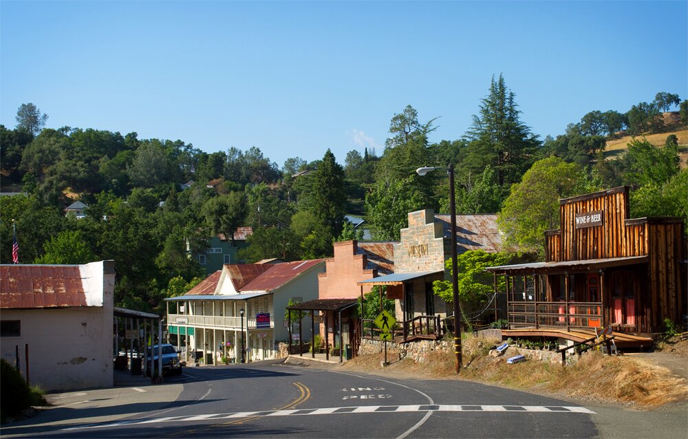 Amador City, CA  smallest town in CA. Grub, Grog,Goods, Lodging and Dancing in the Street every Sat. night through the summer
