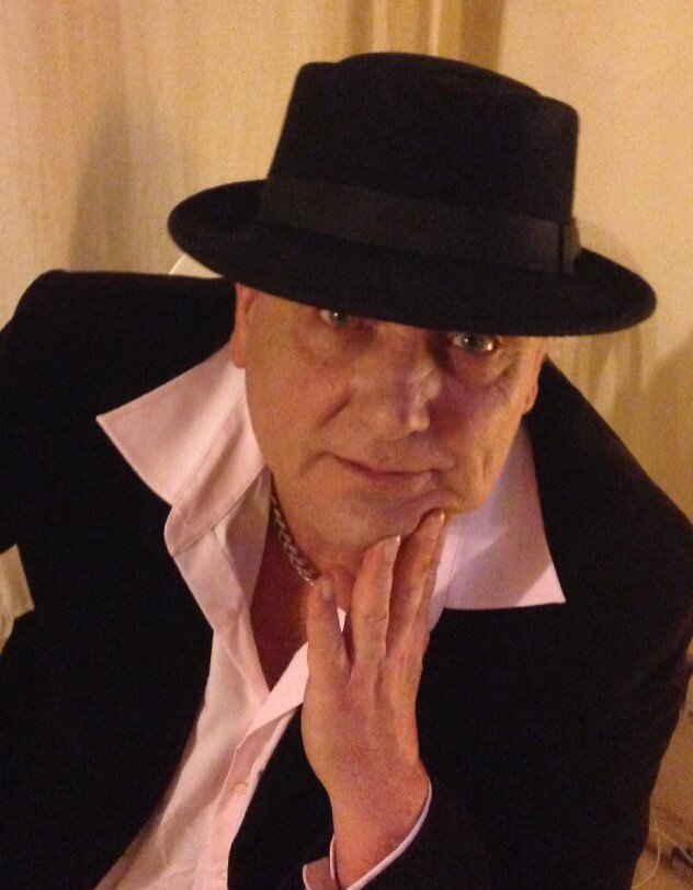 singer, all round entertainer, loon, not all there Birmingham based