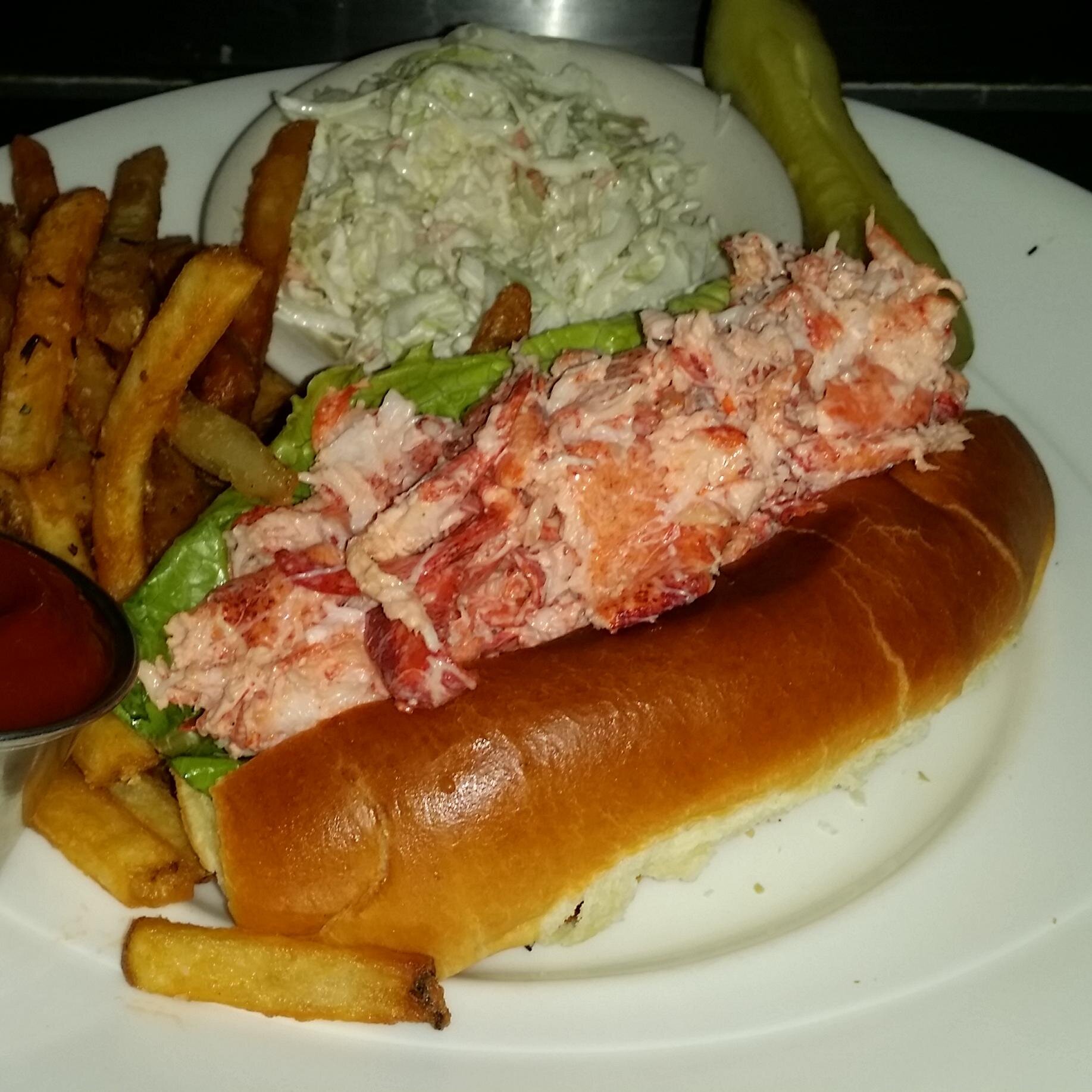 Newton Highlands eatery that serves modern takes on traditional comfort food alongside a full bar and market area with sandwiches, salads and sweets.