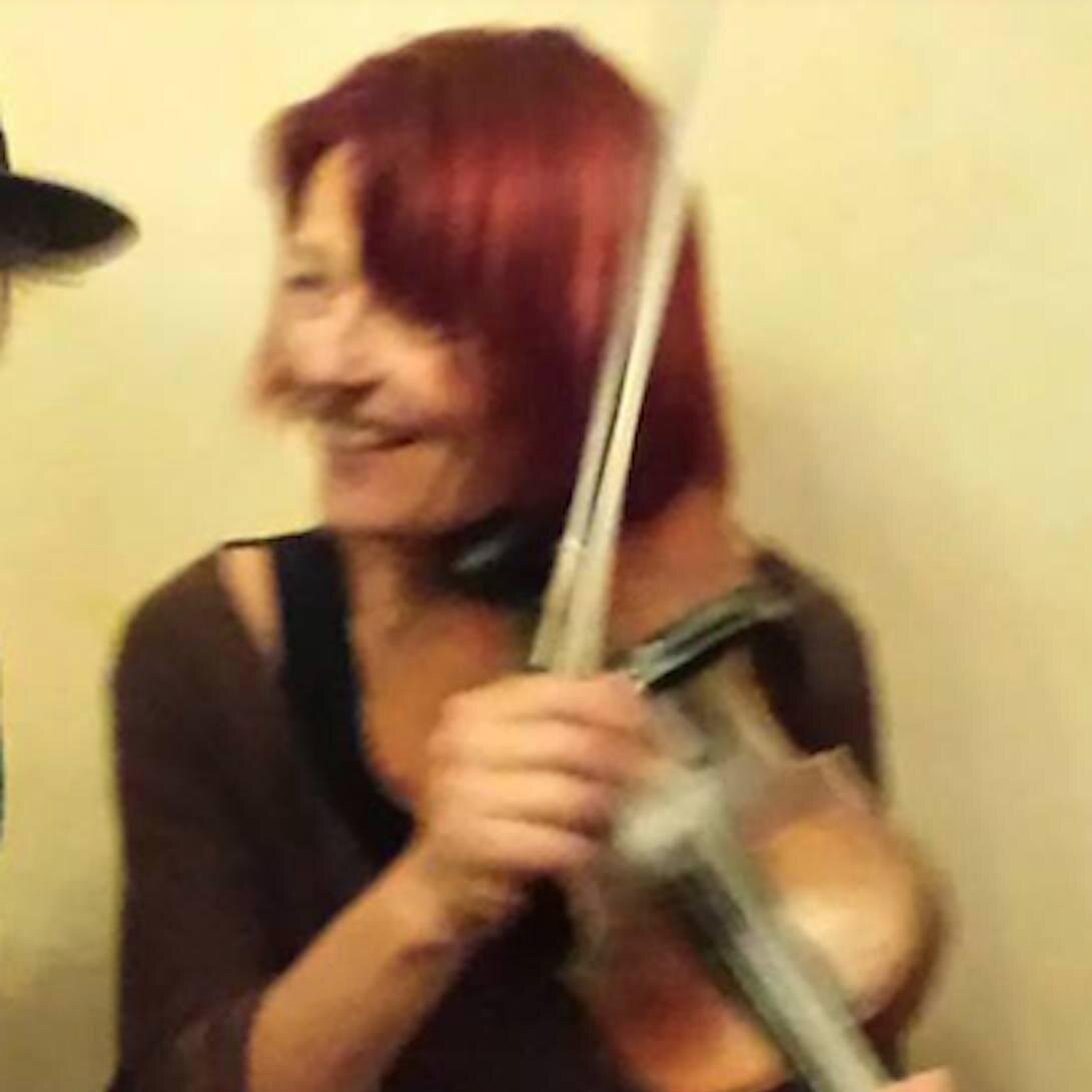 Fiddler and self-confessed band slut.