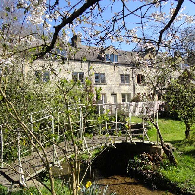 Beautiful stream-side Cotswold Stone holiday cottage in the iconic Slad Valley, Gloucestershire.