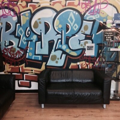 Nic's barber shop , men's hair , ladies hair , professional body piercing , and also tattoo studio .