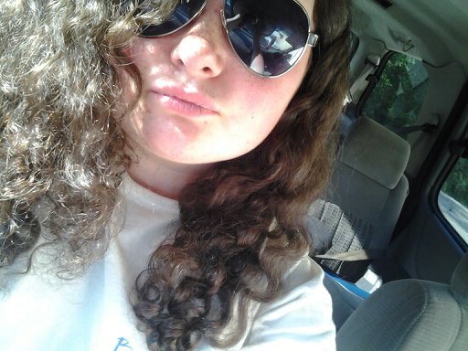 I love music and art! I play volleyball and am curently in highschool (: I got them natural curls :)