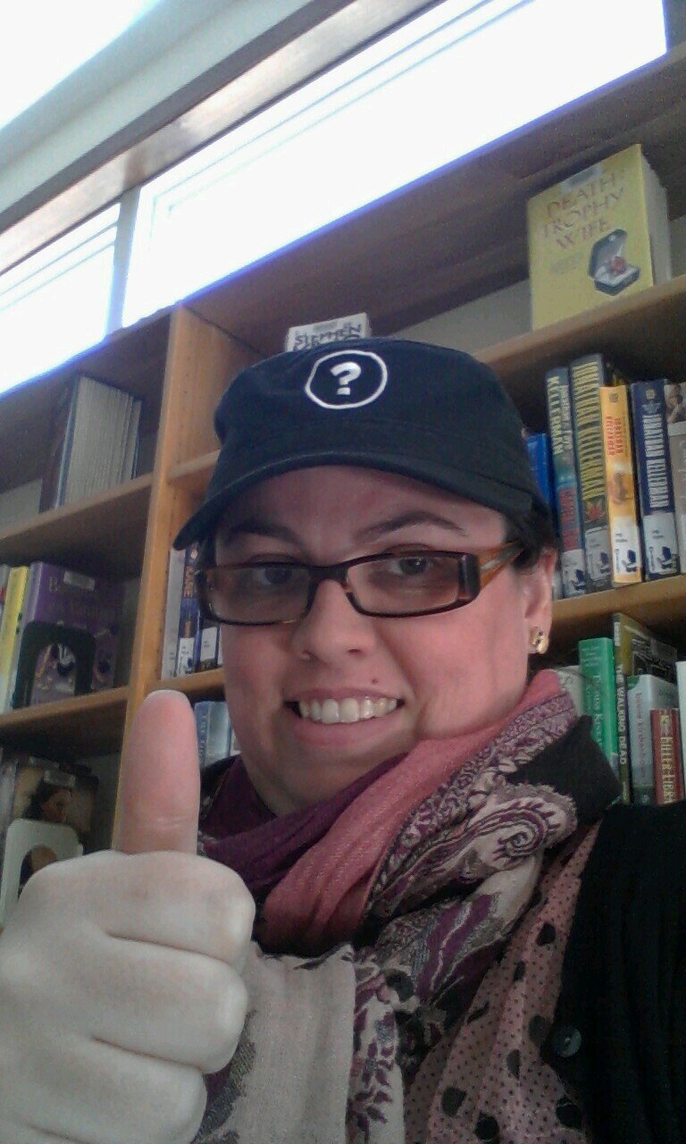I am a small-town librarian. I am dedicated to my family, my home, and sharing a love of reading.