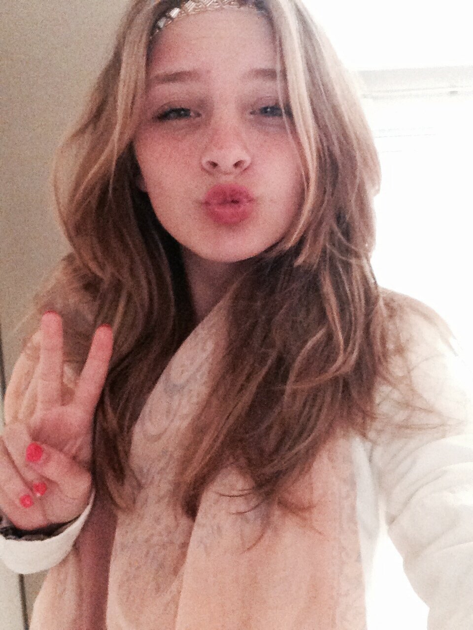 Belieber , Arianator , Follow me (: 
Happy girl! 3