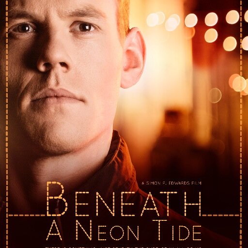 Beneath a Neon Tide is an independent drama film of love and addiction starring Tom Grace and Jessica Messenger
