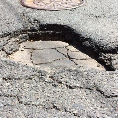 I'm a pothole. I rattle axles and shake houses when struck. #JerseyCity