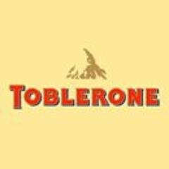 Toblerone, coklat unik dari Swiss berbentuk segitiga dengan paduan madu & almond nougat.