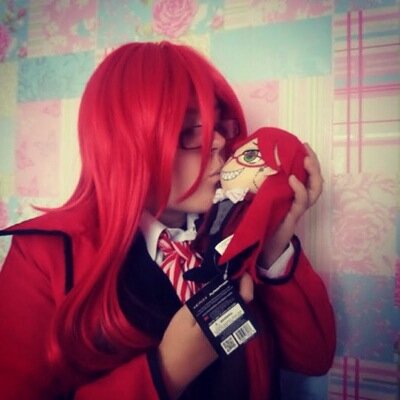I am english. I love anime, tim burton and comic books! I am a big cosplayer!