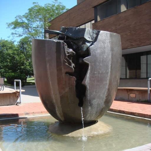 A quiet campus where the math is hard, the construction is loud, and the buses circle endlessly while we all pretend to study.
