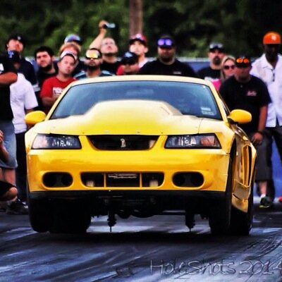 Just a little small tire car stuck in a sea of big tire monsters.