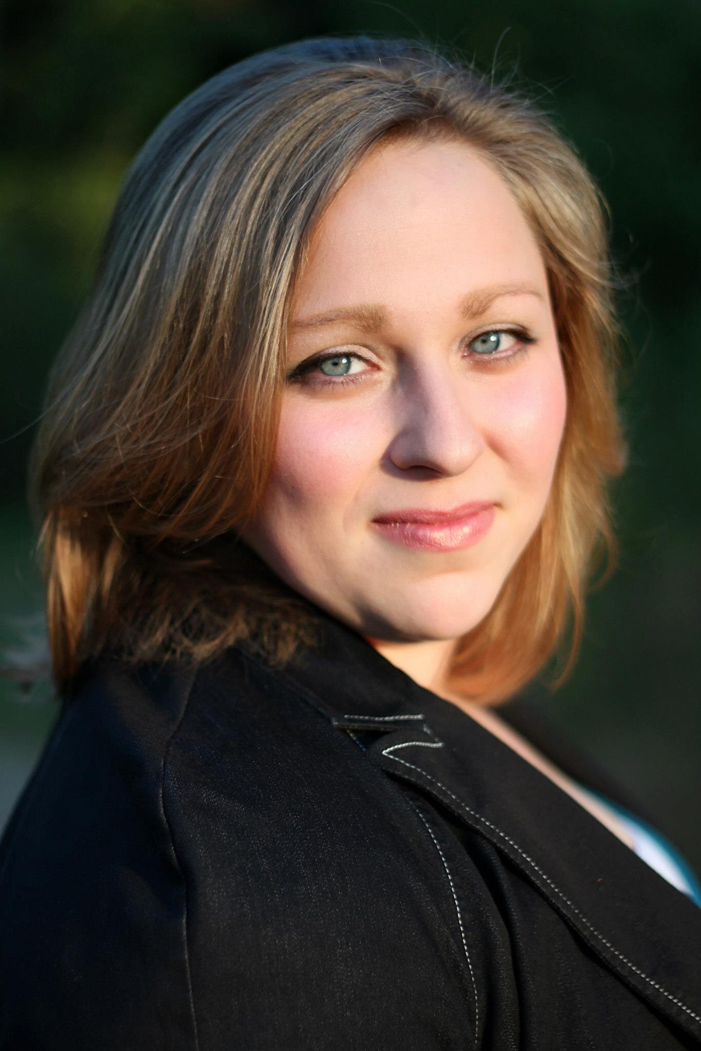 Opera singer, dog lover, and library goer with a travel bug and an affection for peanut butter and chocolate.
