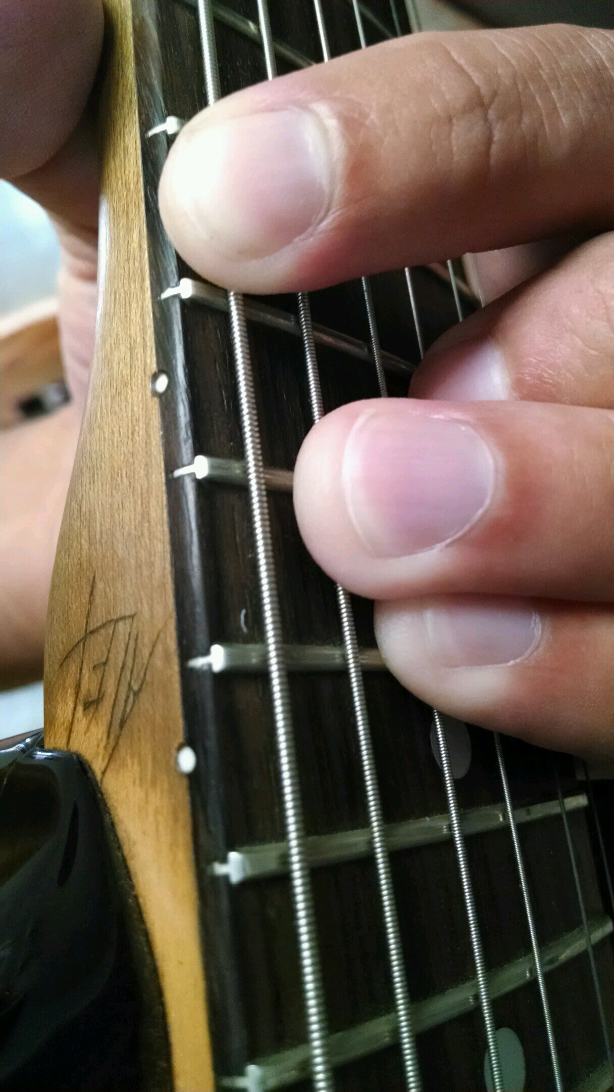 Six strings and red shoes leads to words that shine through... the everyday sights and sounds.. of life...