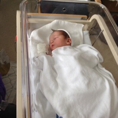 The latest edition to the Reid clan. Totally outnmbered for the rugger and footie on the telly. YNWA