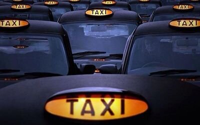 a real scouser in da cobbles of liverpool driving a black cab listening to all kinds of shite